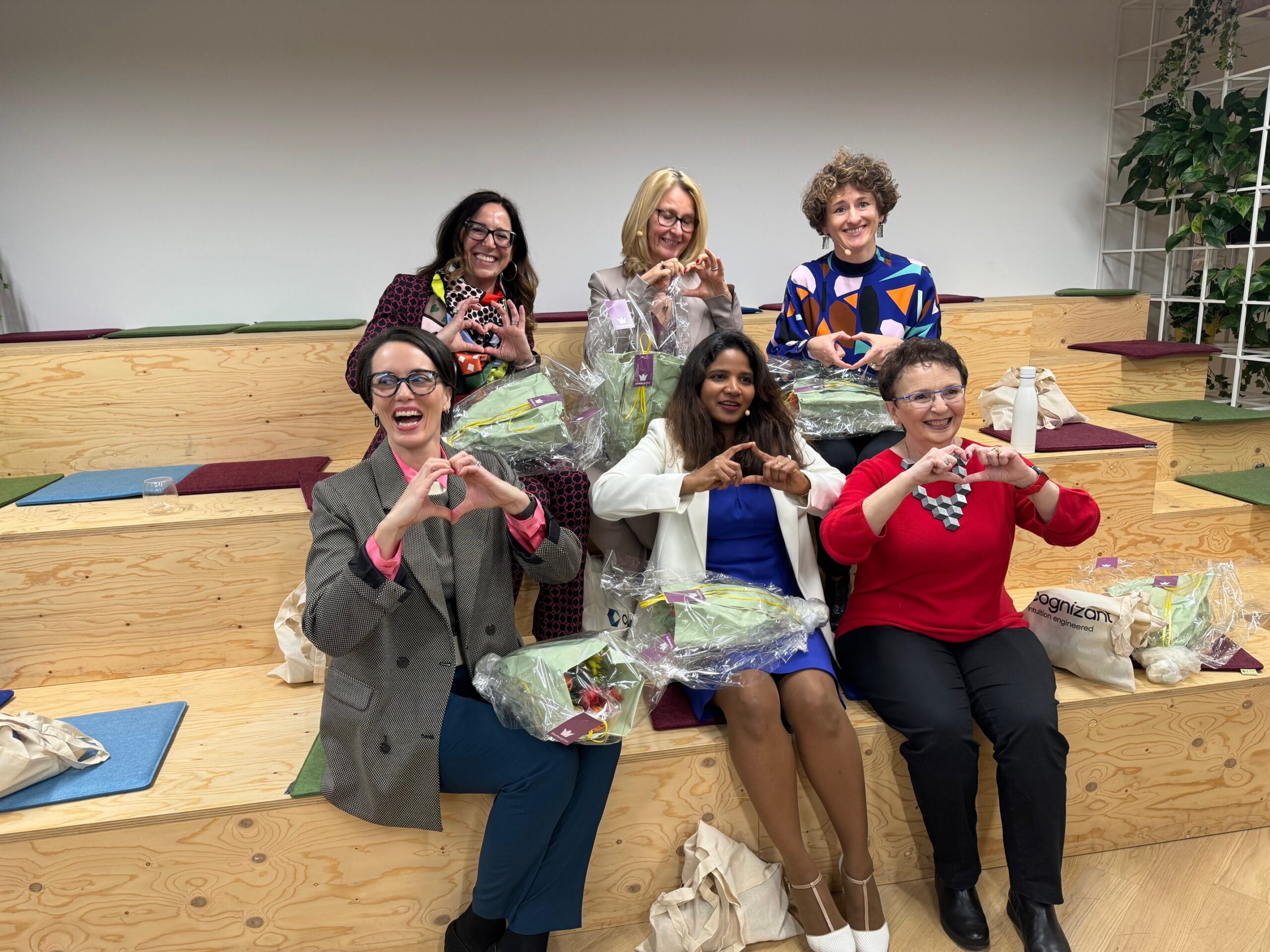 Women's Day at Cognizant: Back row, from left: Silvia Signoretti, Nicole M. Heimann, Aliye Fiebig; front row, from right: Raya Volinsky, Indu Nair and Liza Engel.